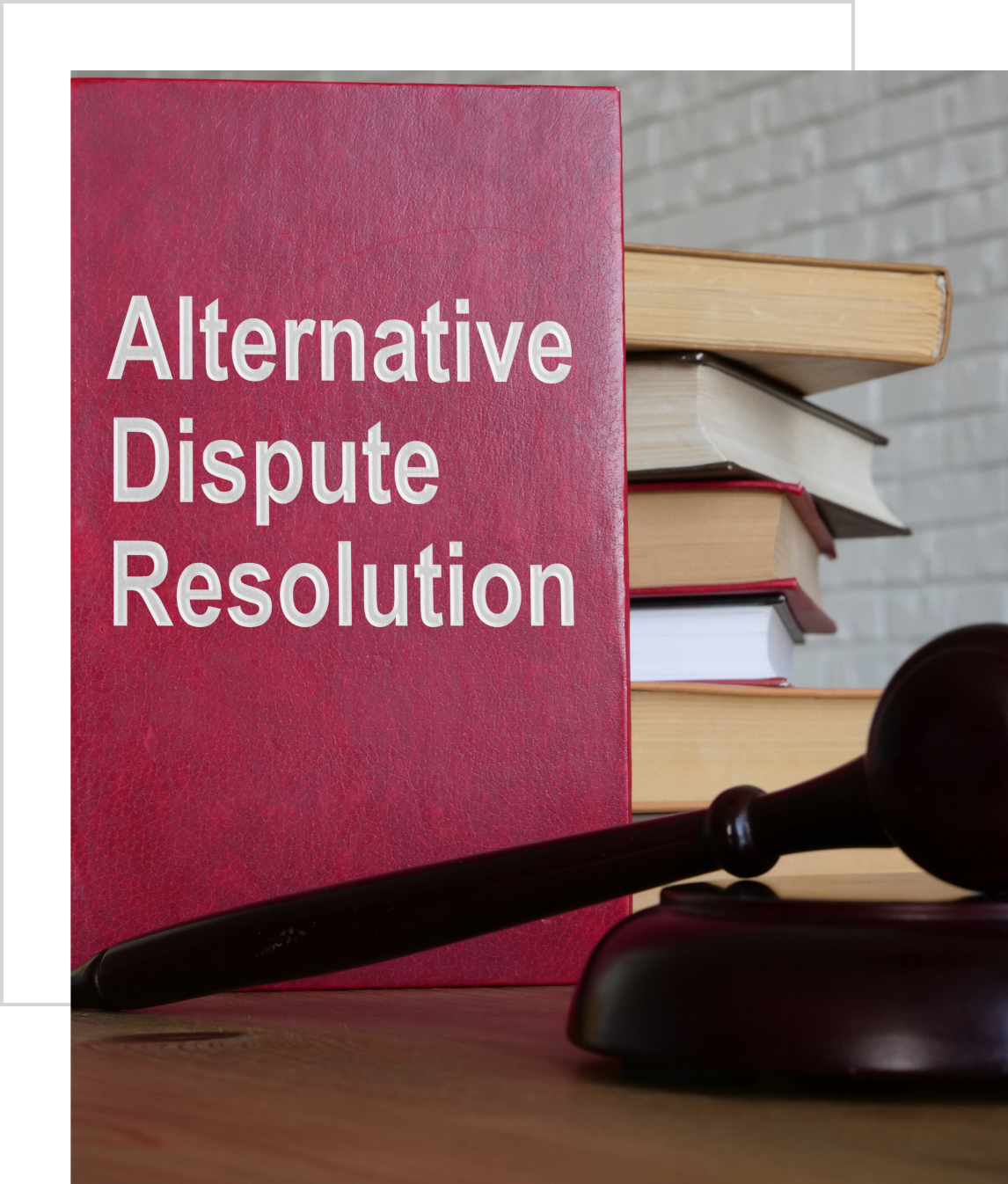 Legal books and gavel on table