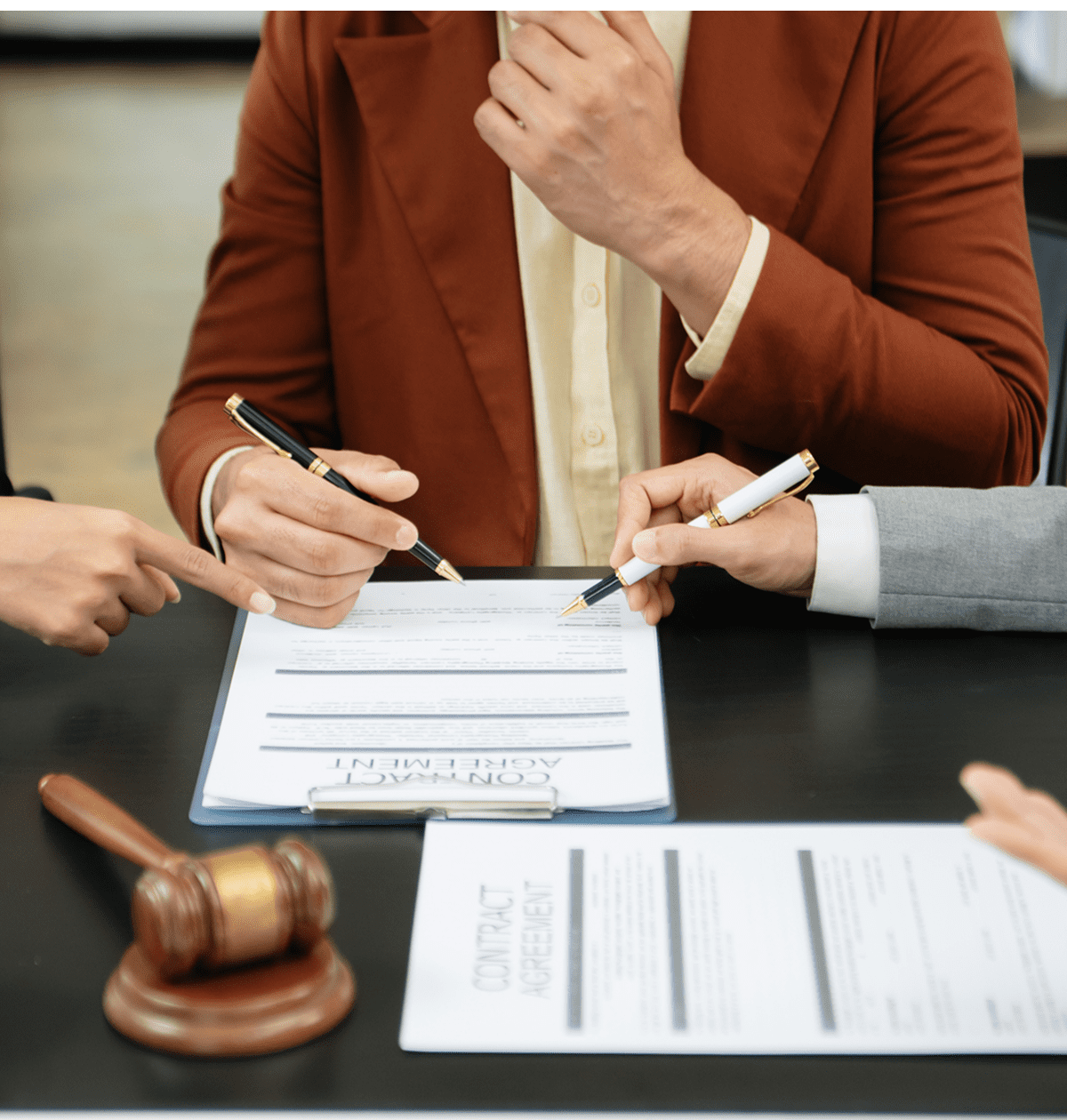 Business meeting with contract and gavel